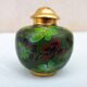Salt and pepper shaker in partitioned enamels