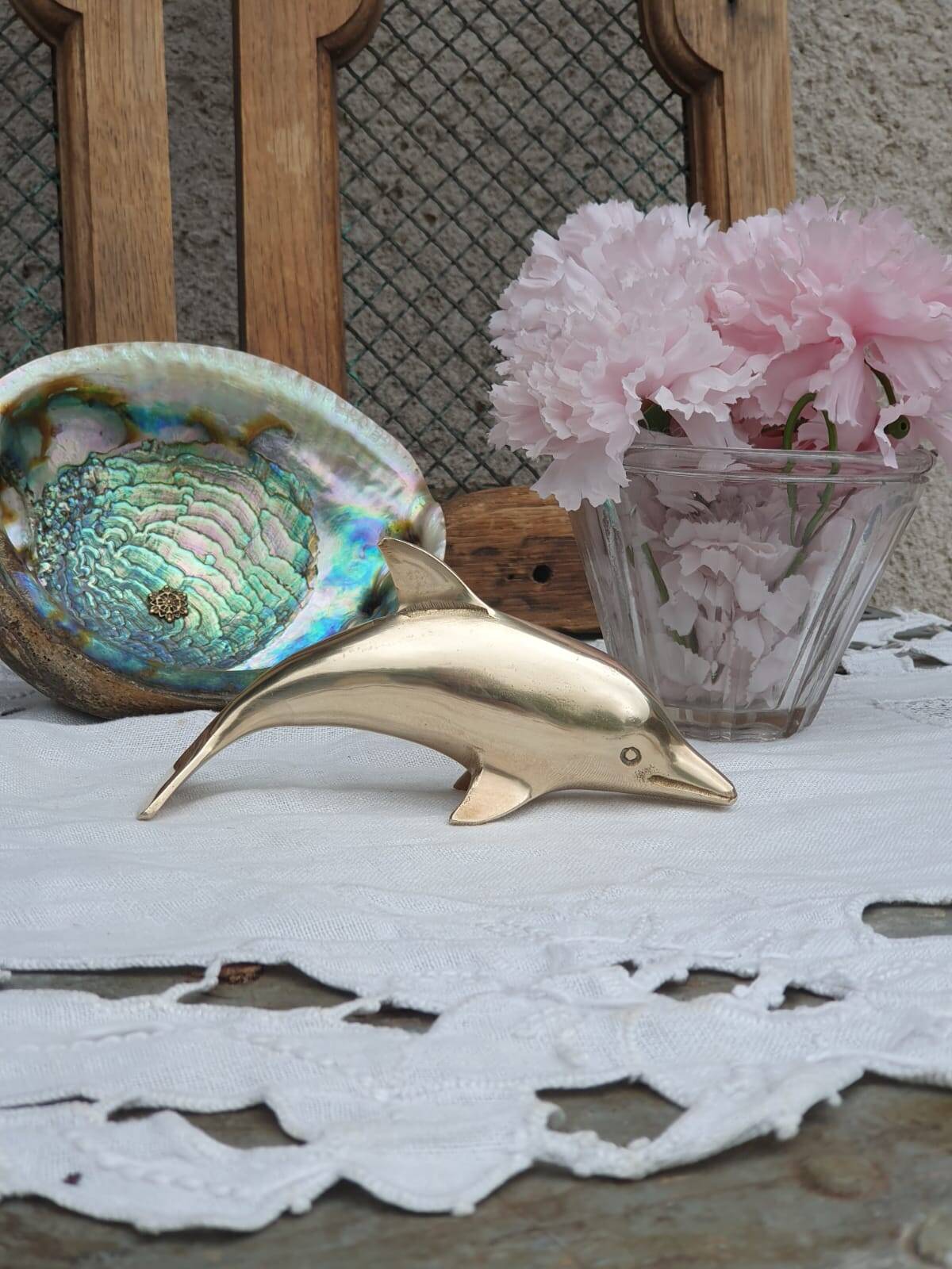 brass dolphin