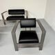 Brutalist living room with faux metal armchairs designed by Karl Friedrich Forster