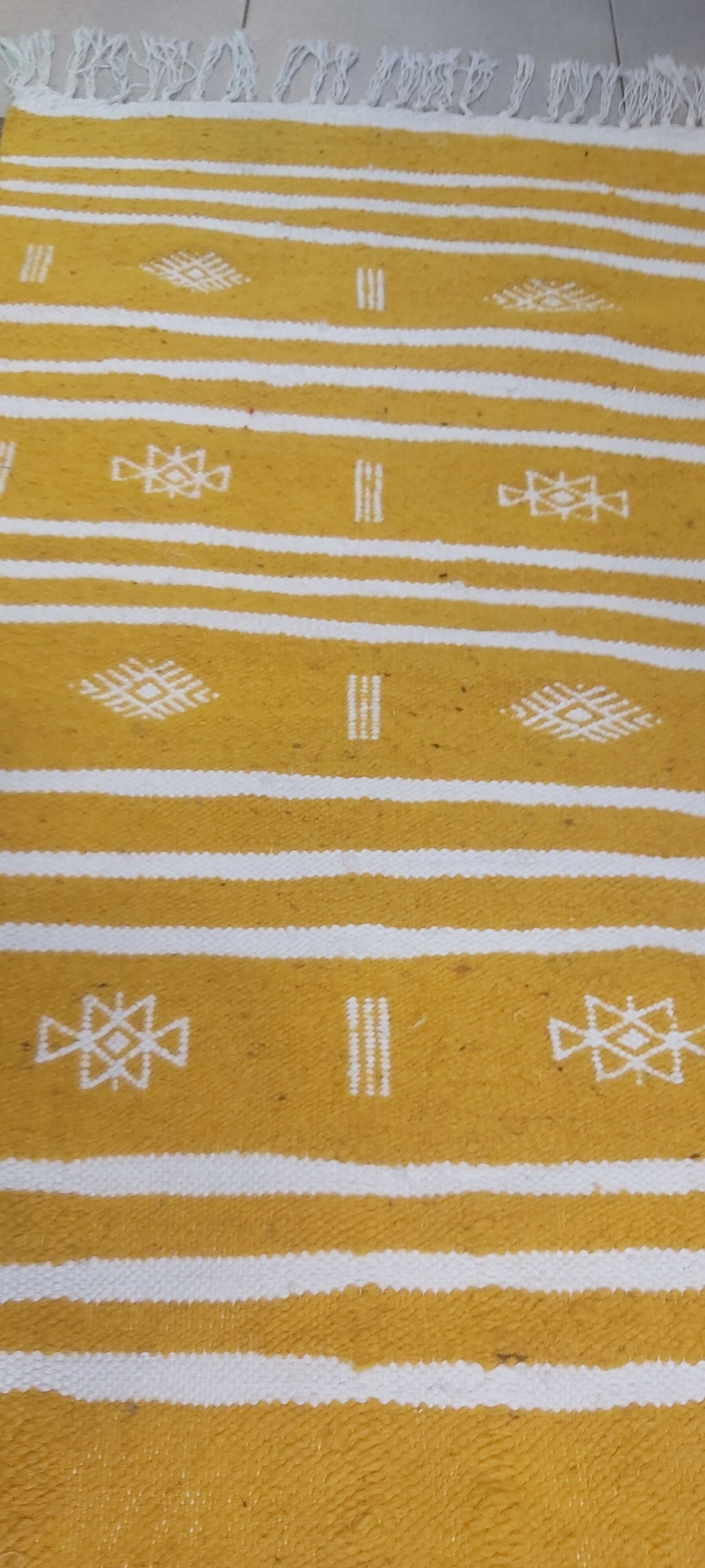 Handmade yellow and white kilim carpet