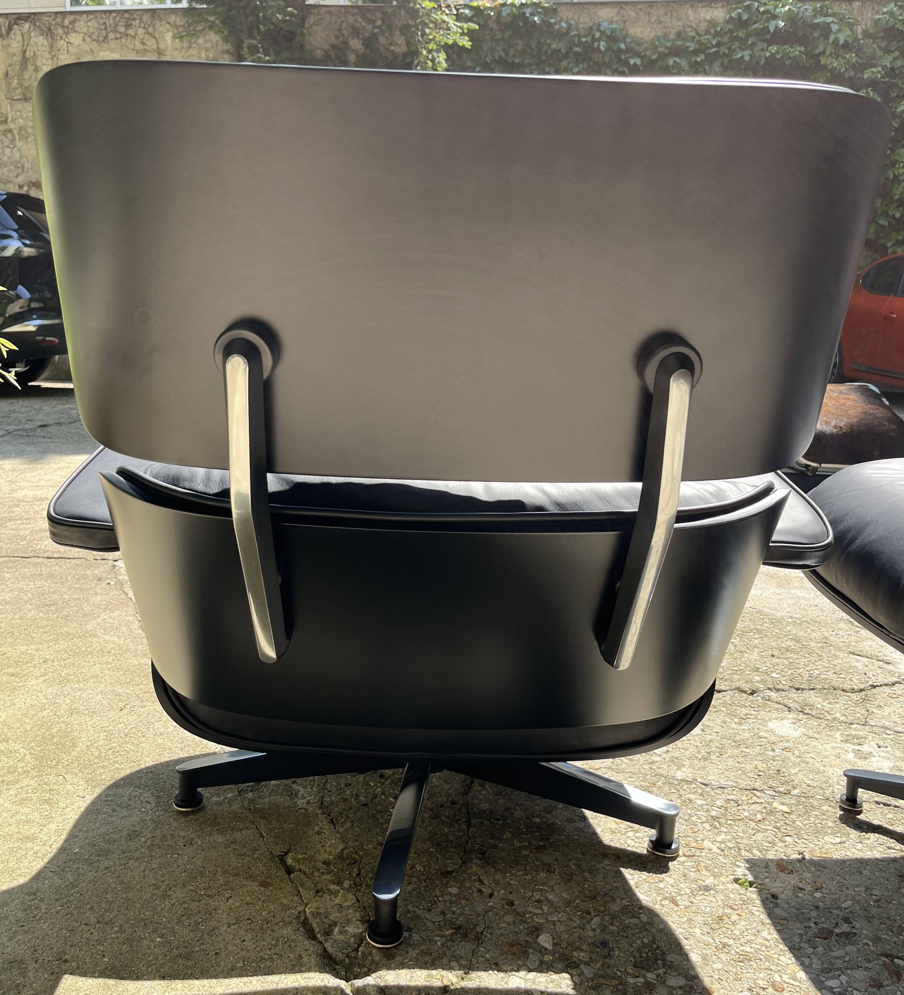 All Black Lounge Chair with Ottoman by Charles Eames