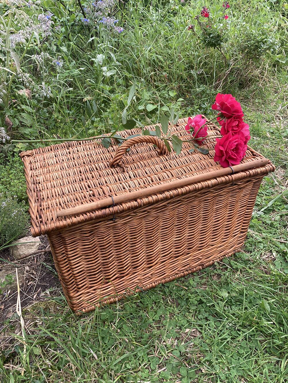 Old wicker basket with closure and handle