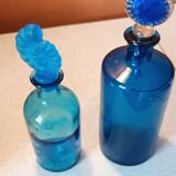 Set of two blue glass bottles