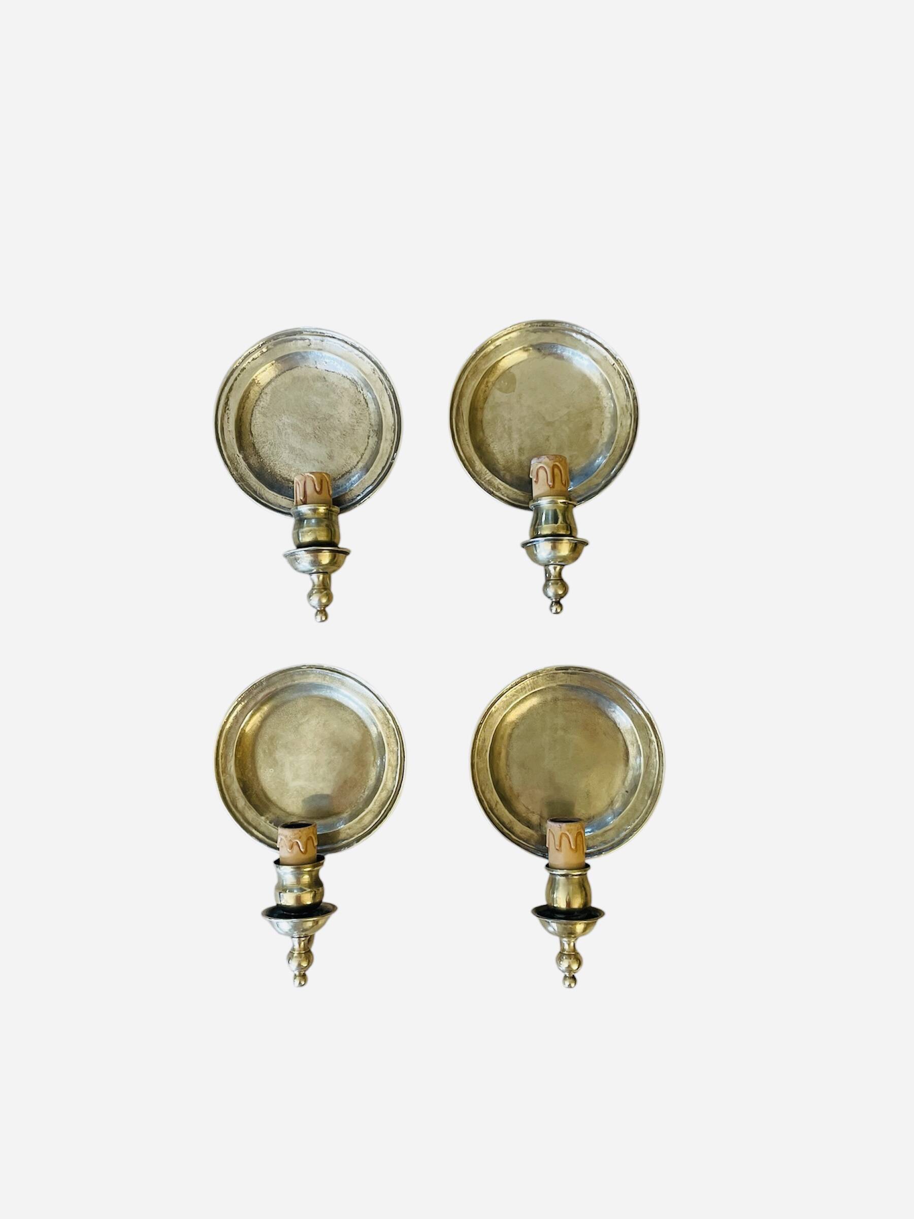 Pair of vintage wall sconces in textured brass, brutalist style.