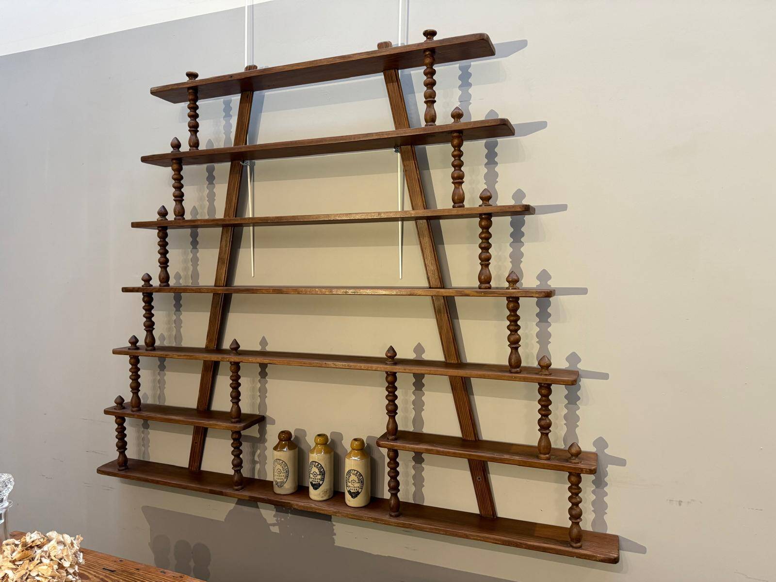 Turned wood bar wall shelf