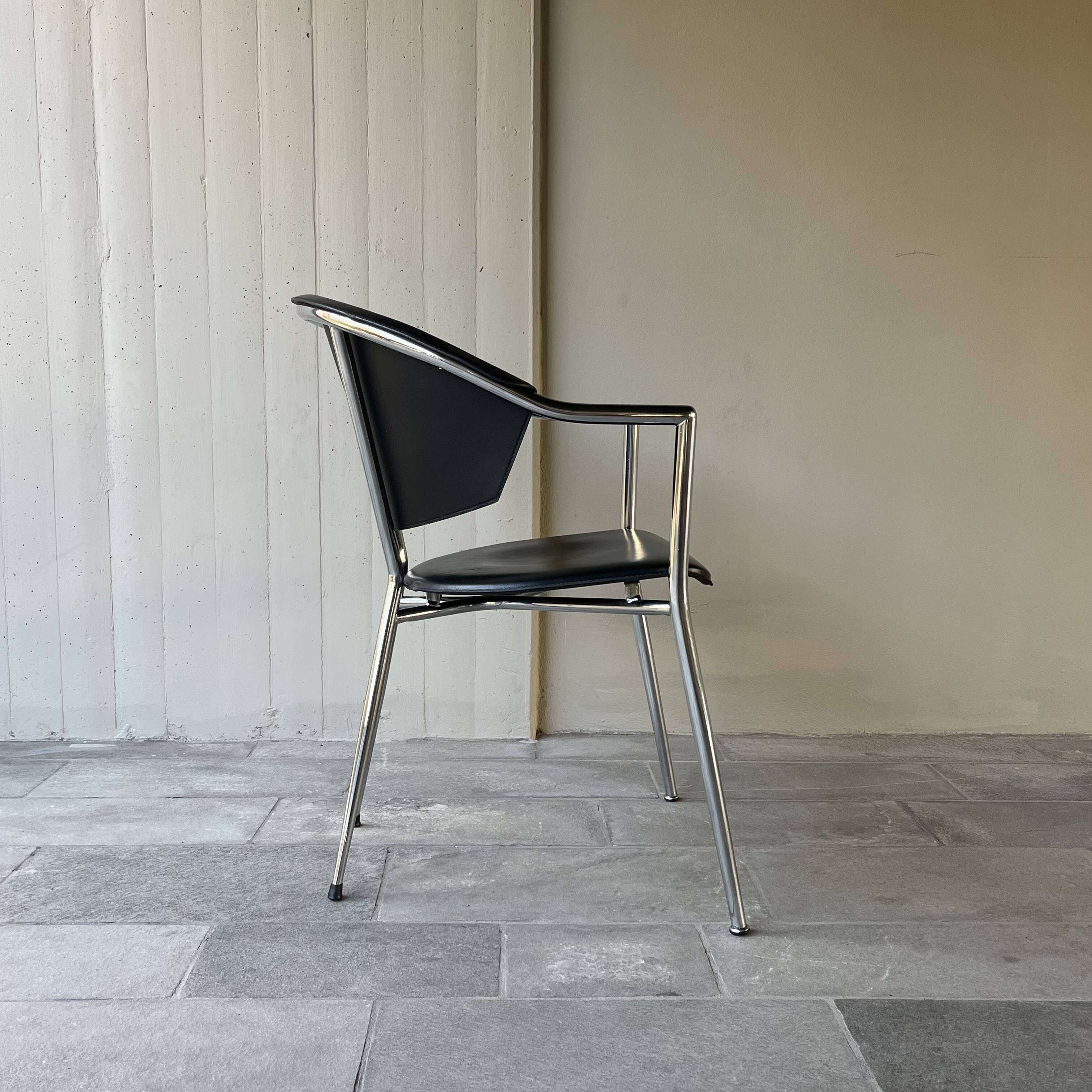 Set of four Italian black leather chairs, 1970