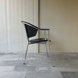 Set of four Italian black leather chairs, 1970