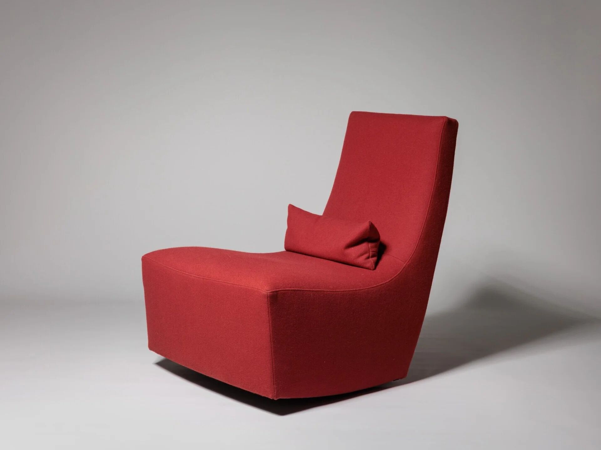 Rocking chair and footstool in red wool by Ligne Roset, France