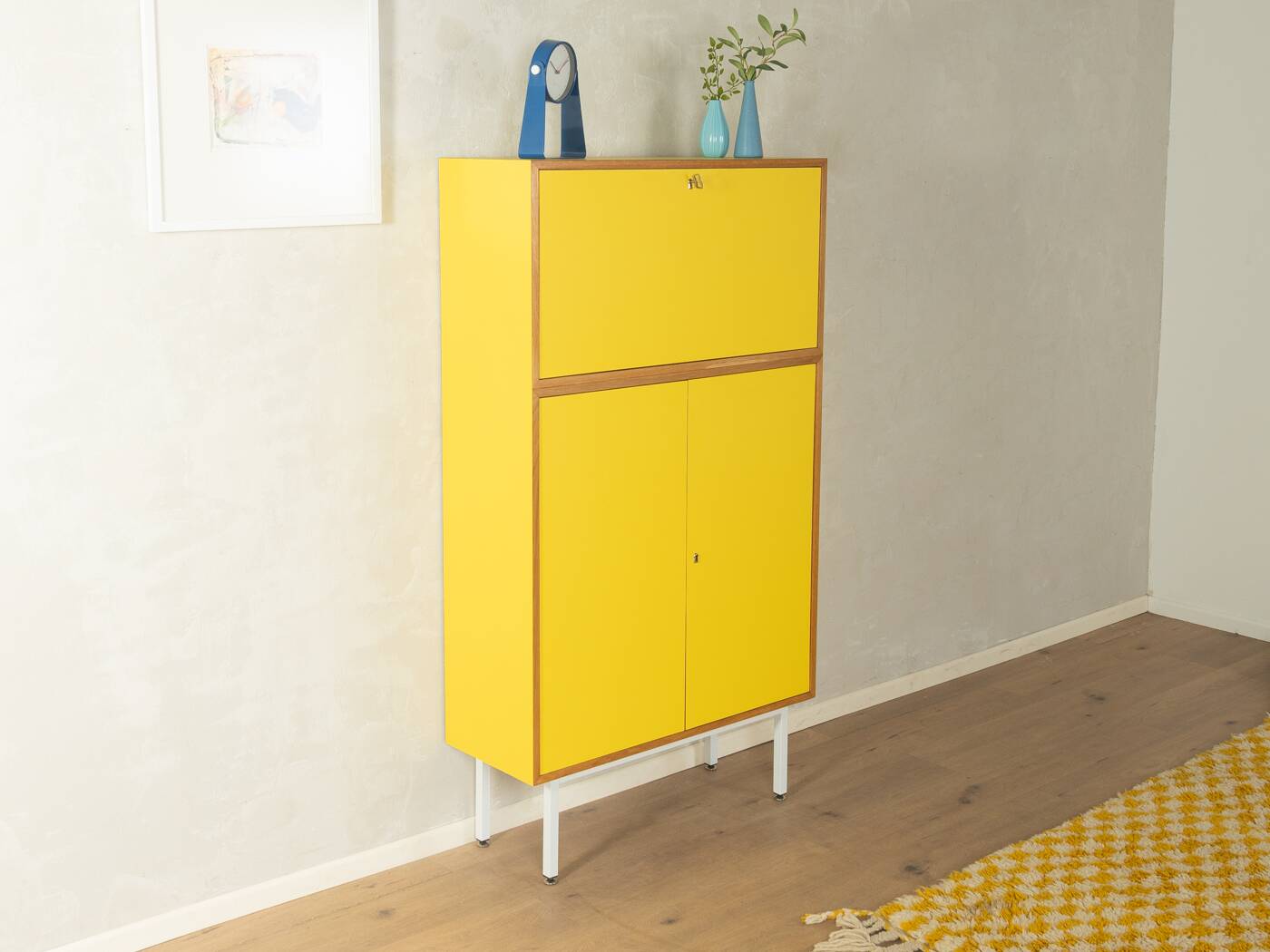Classic sideboard from the 1960s, oak veneer, yellow Resopal, white steel feet