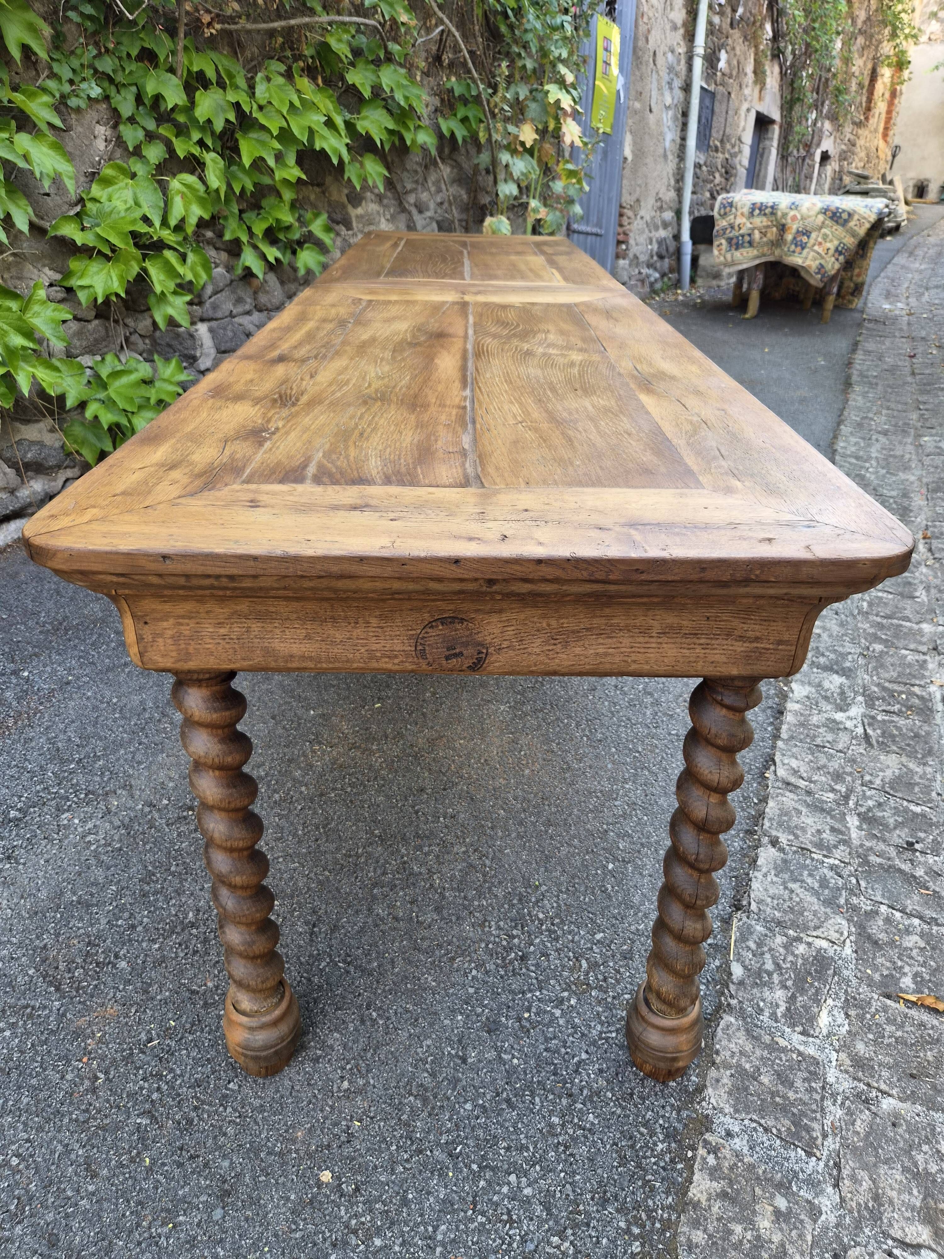 Antique French draper's table in oak, shop counter, work table, 6 feet, circa 1750–1850.