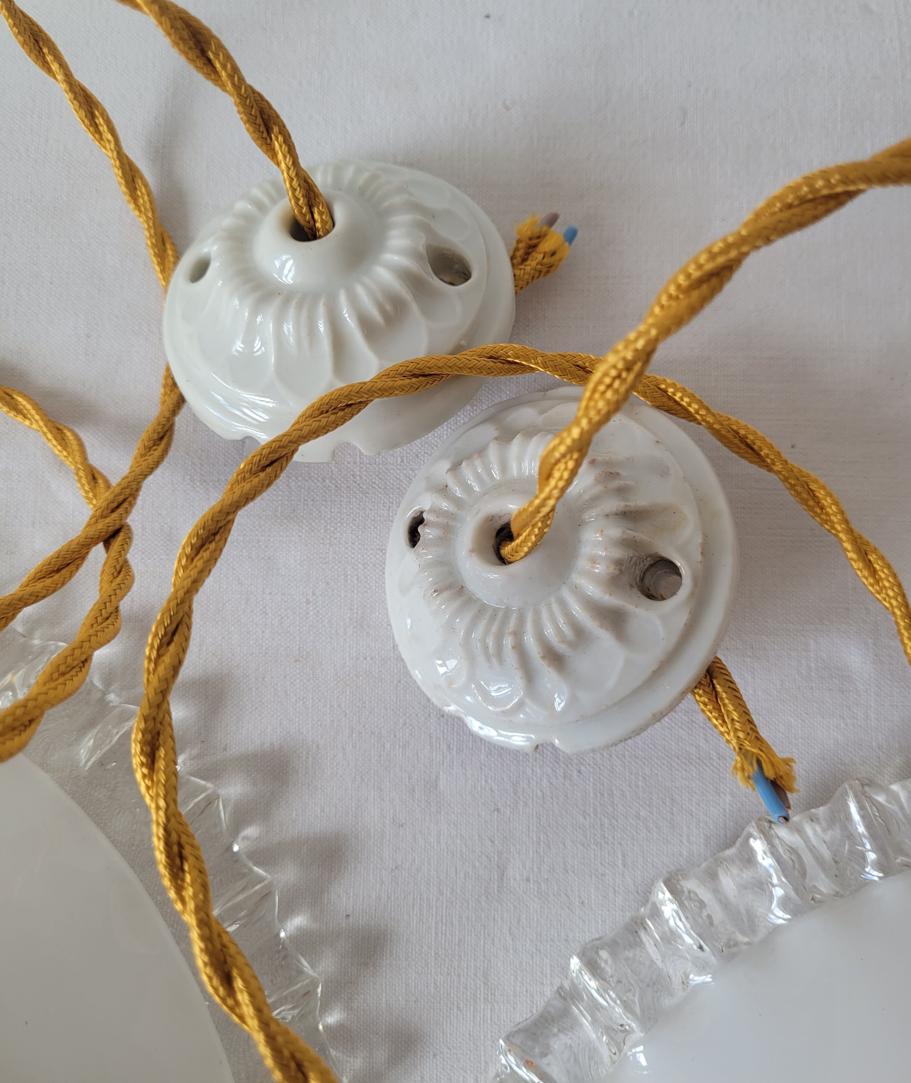 Duo of serrated opaline suspensions