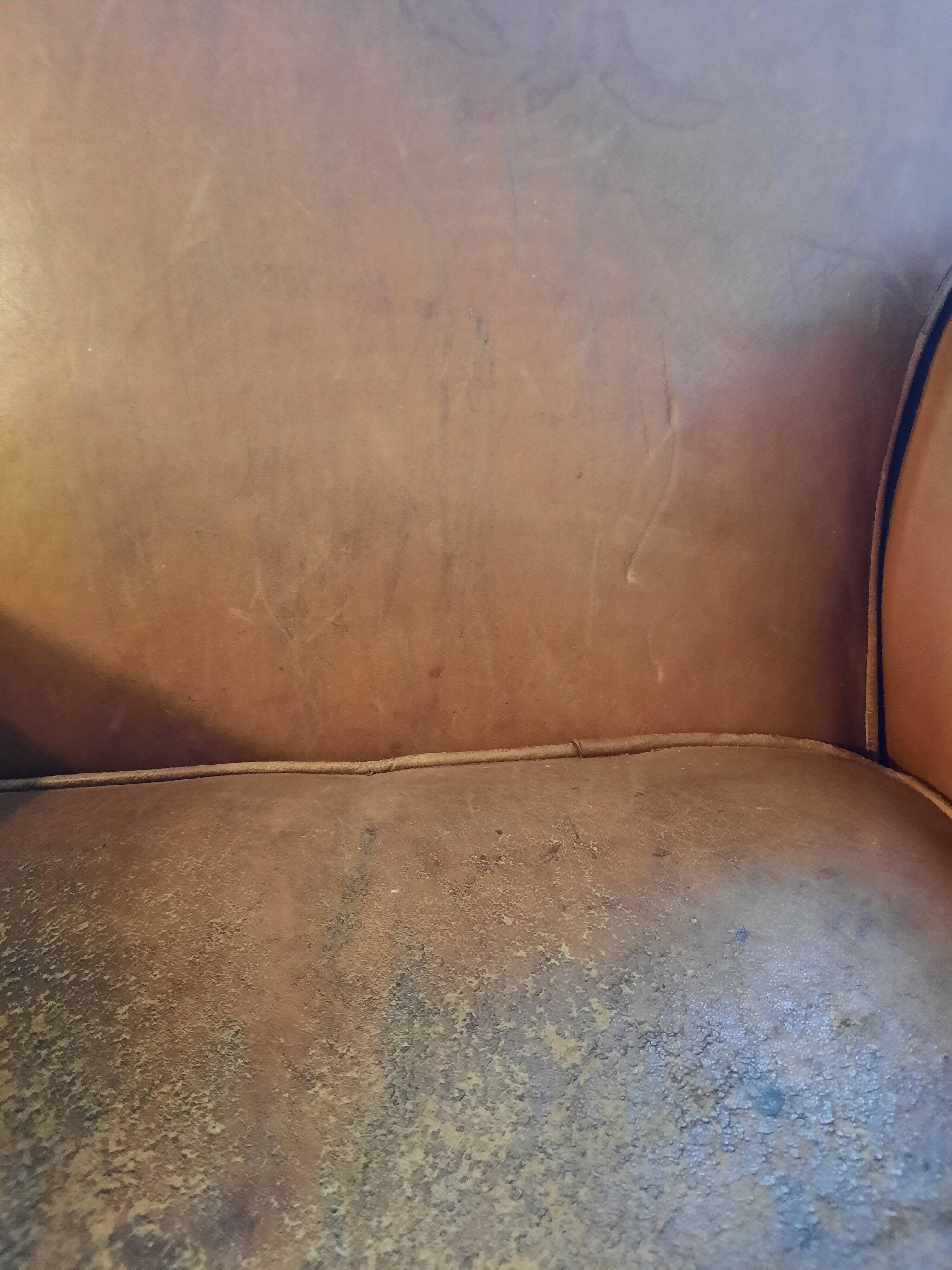 Old leather club chair 1940-1950