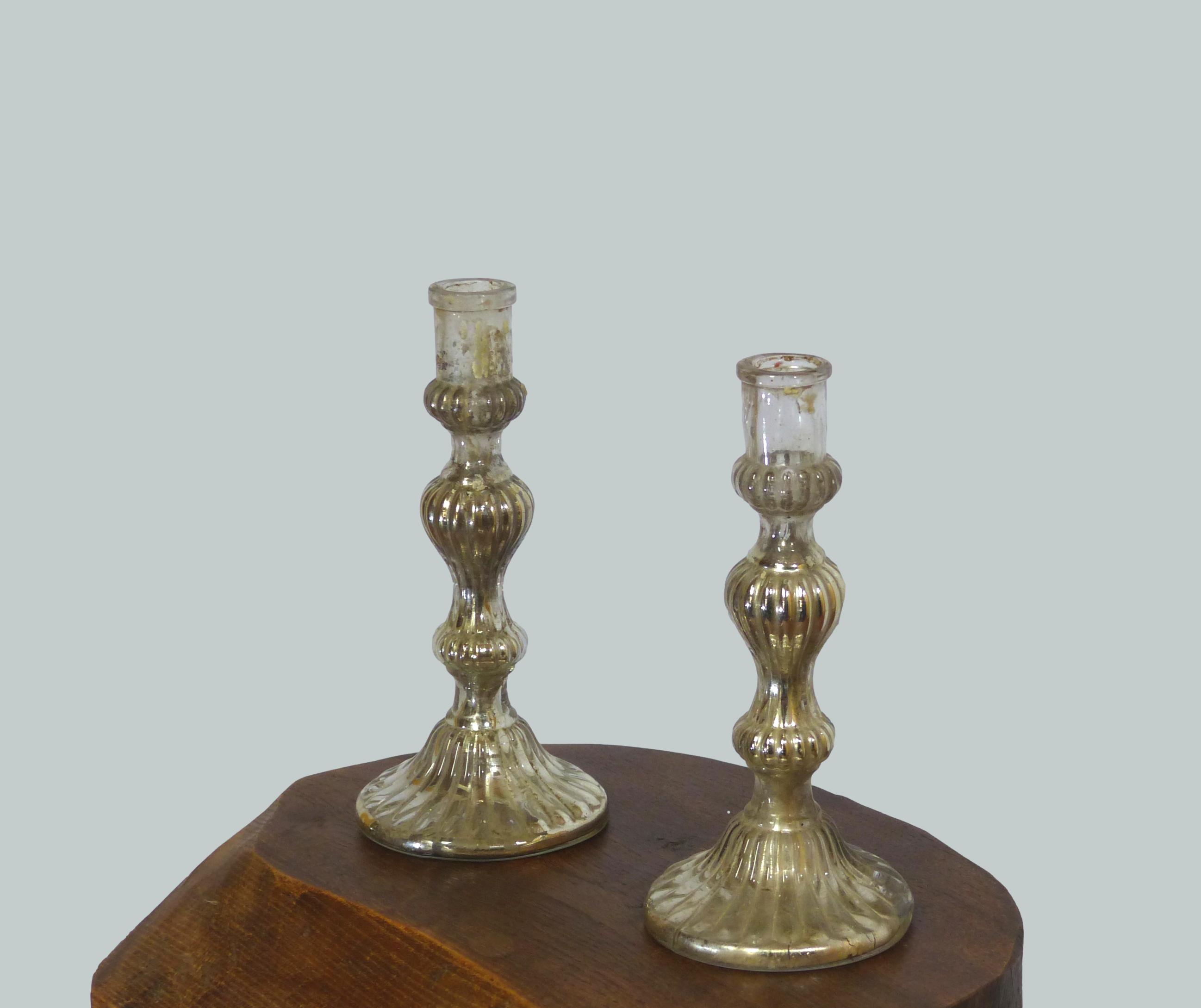 Pair of candle holders in eglomerized glass