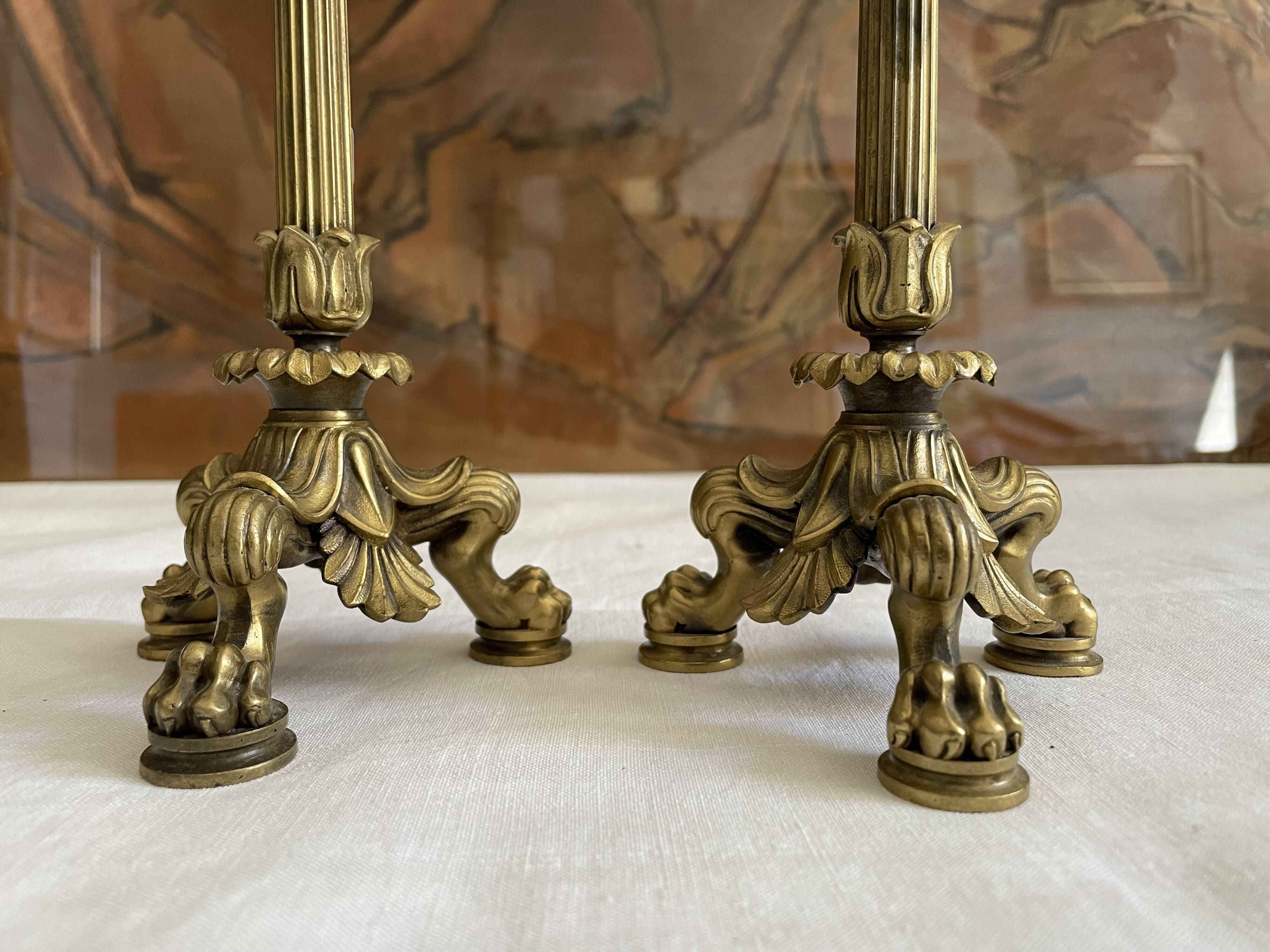 Pair of bronze candle holders