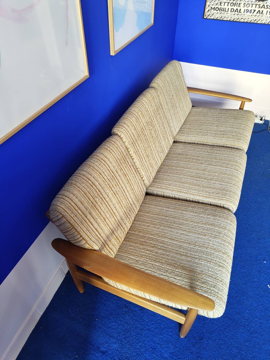 Scandinavian sofa in wood and vintage fabric from the 60s