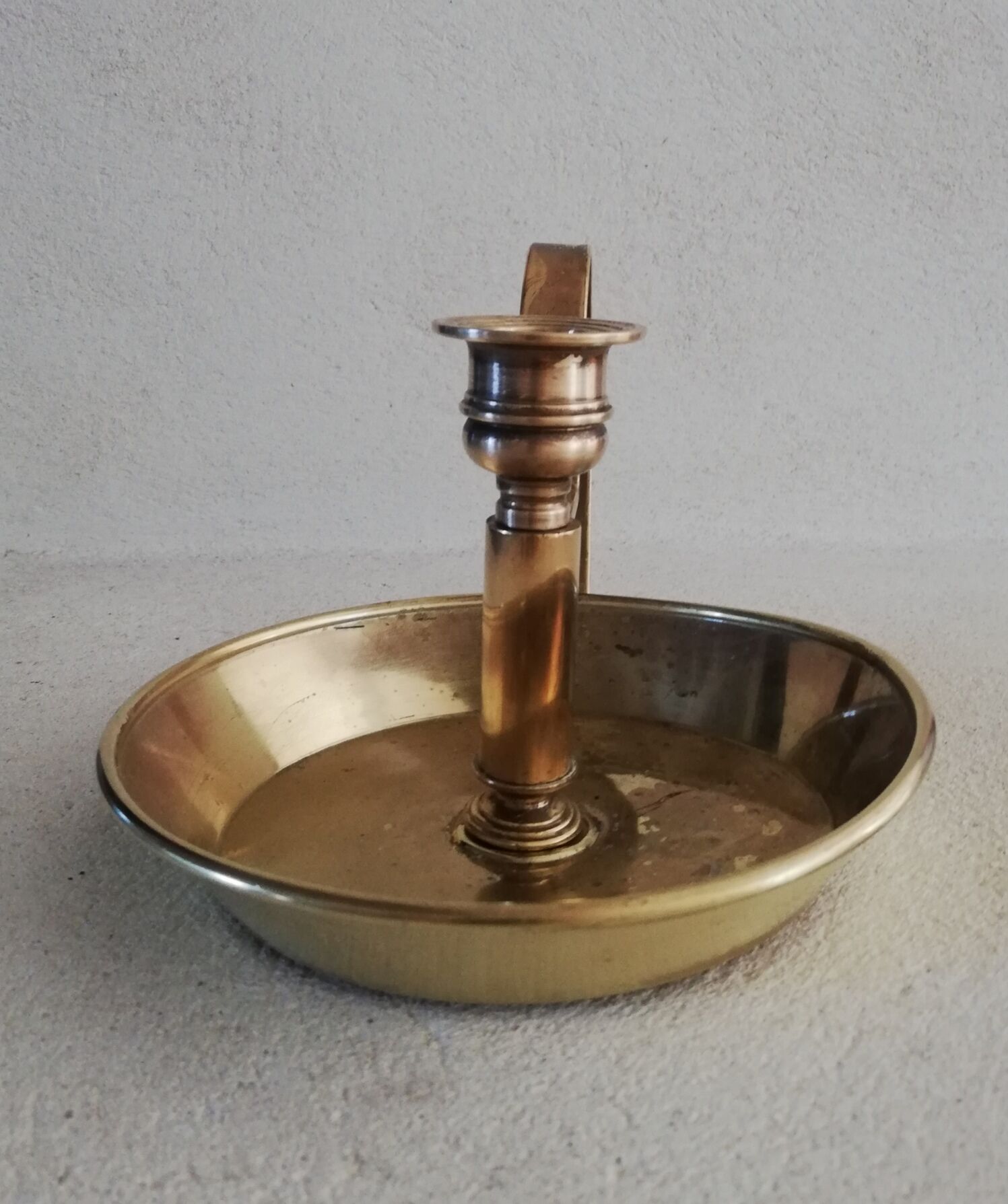 Brass hand candle holder