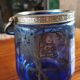 Old ice or biscuit bucket made of golden decor blue glass