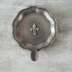 Old fleur de lys ashtray in pewter