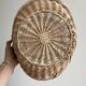 Large antique woven wicker basket with handle.