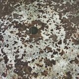 Old cast iron art-deco garden table