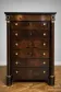 Empire period chest of drawers, early 19th century, in flame mahogany.