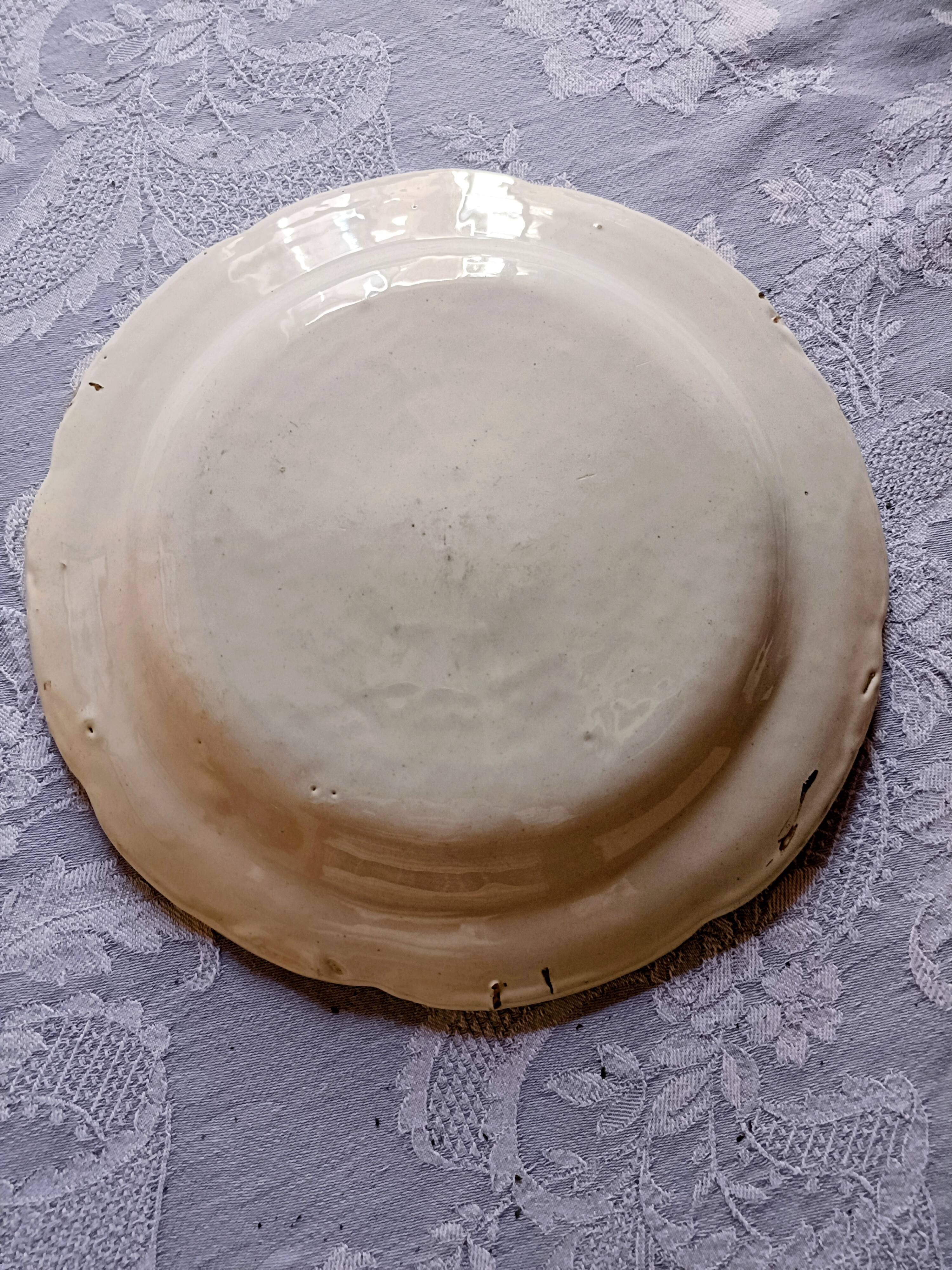 Assiette faïence de l'est St Clément décor tulipe