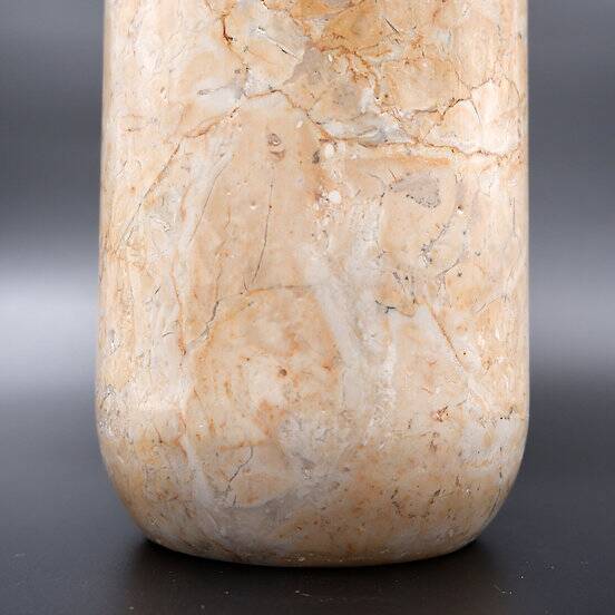 Cylindrical marble vase with fossil motif
