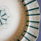 A plate made of earthenware decorated with flower crown