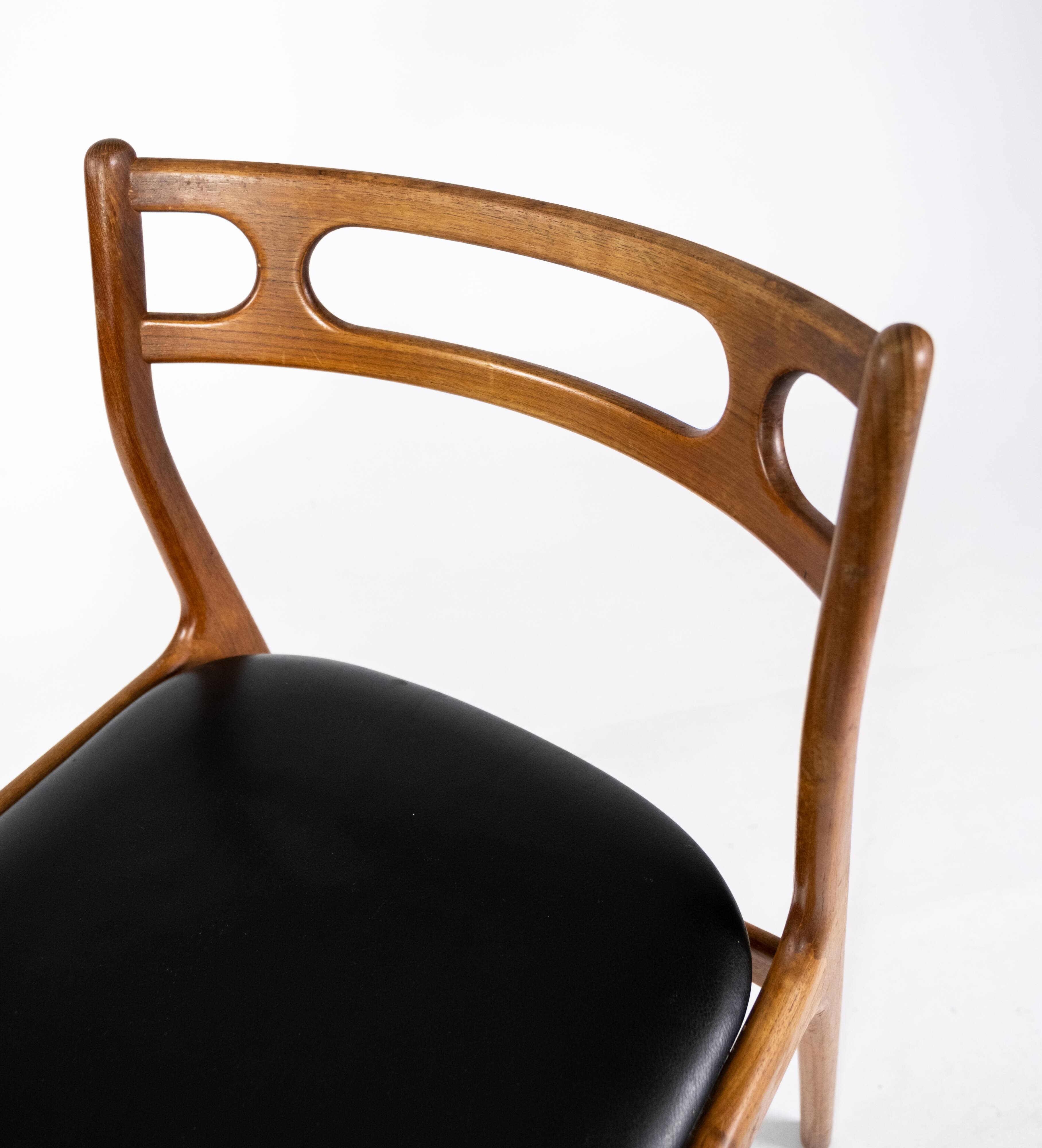 A set of four dining room chairs of teak of danish design, 1960s