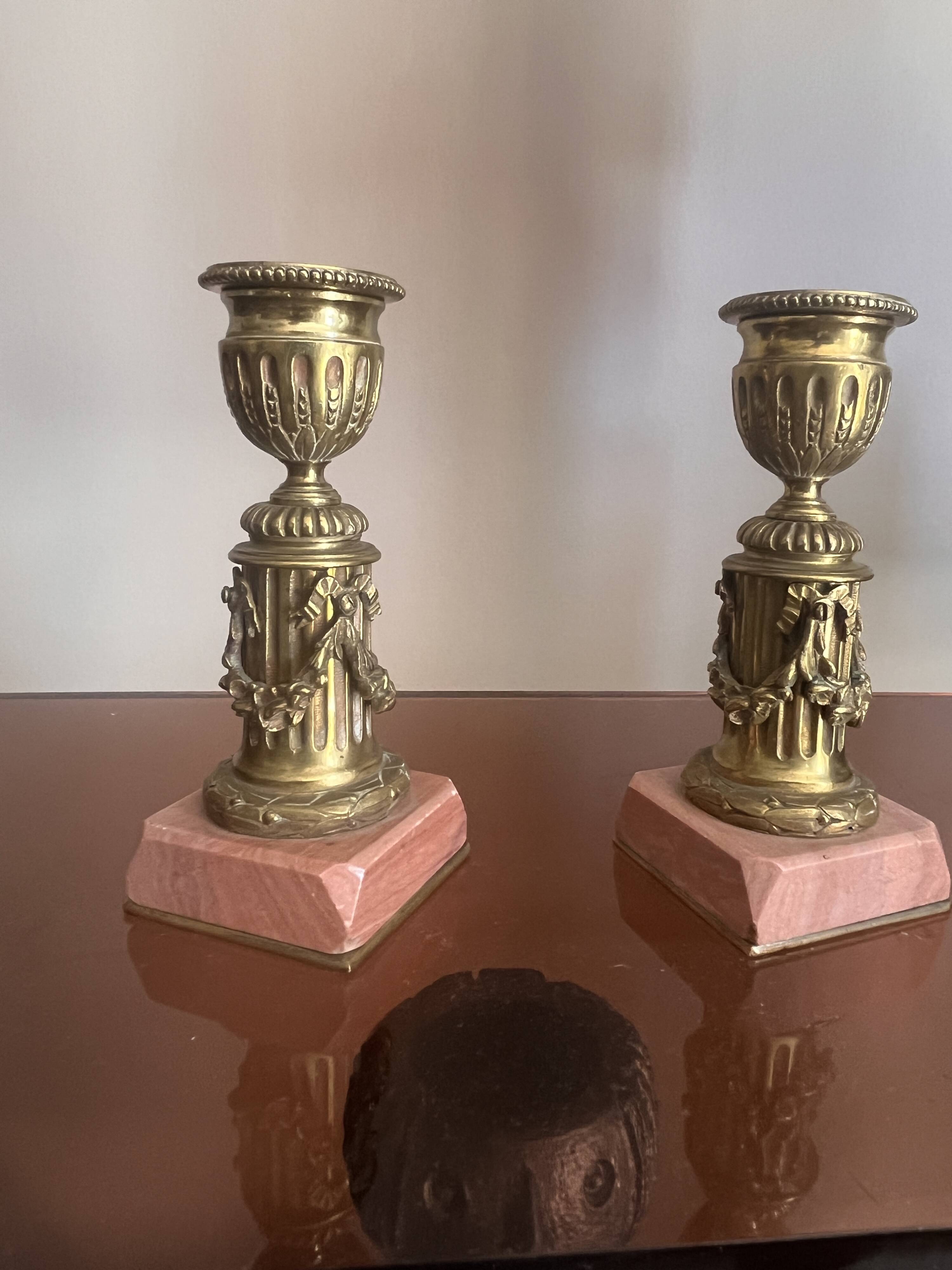 pair of antique bronze candlesticks