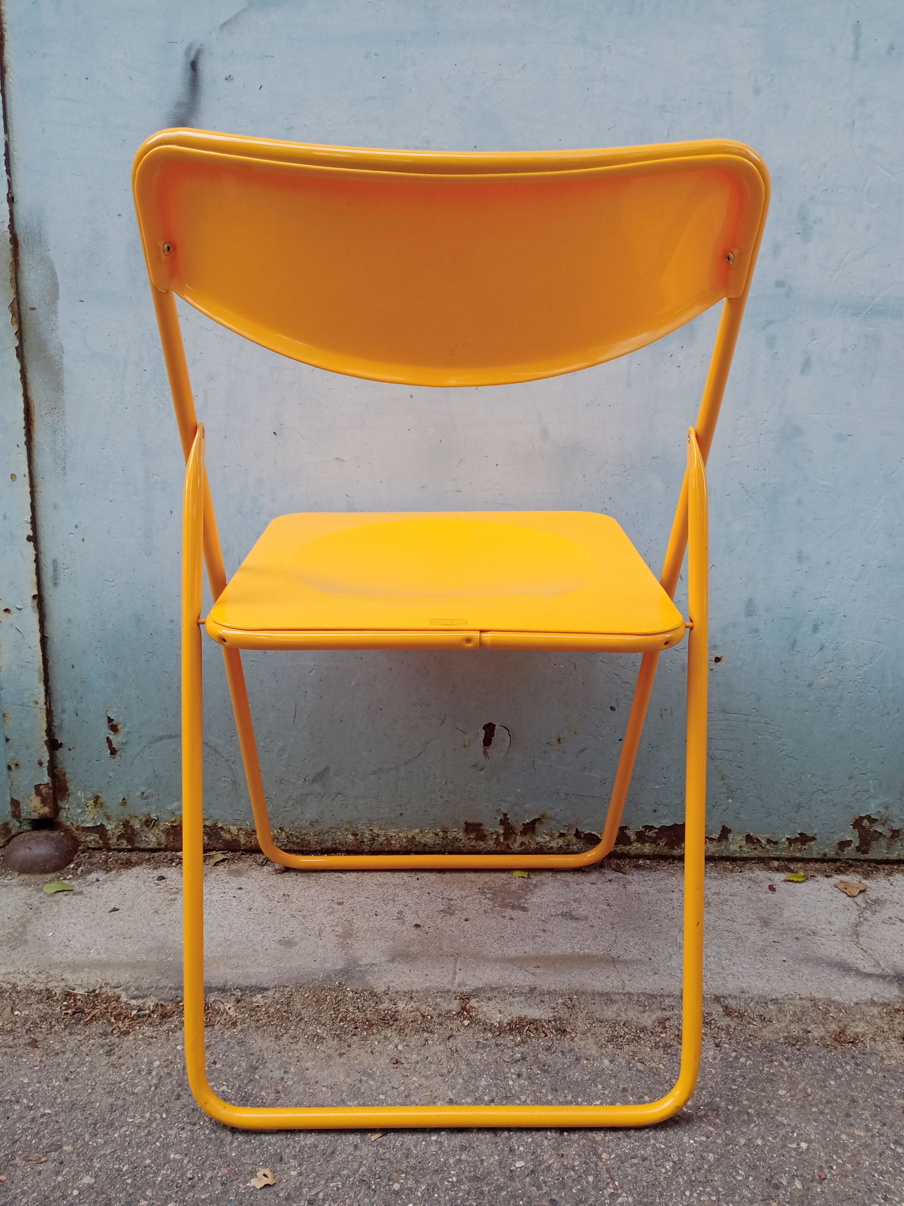 Orange vintage folding chairs