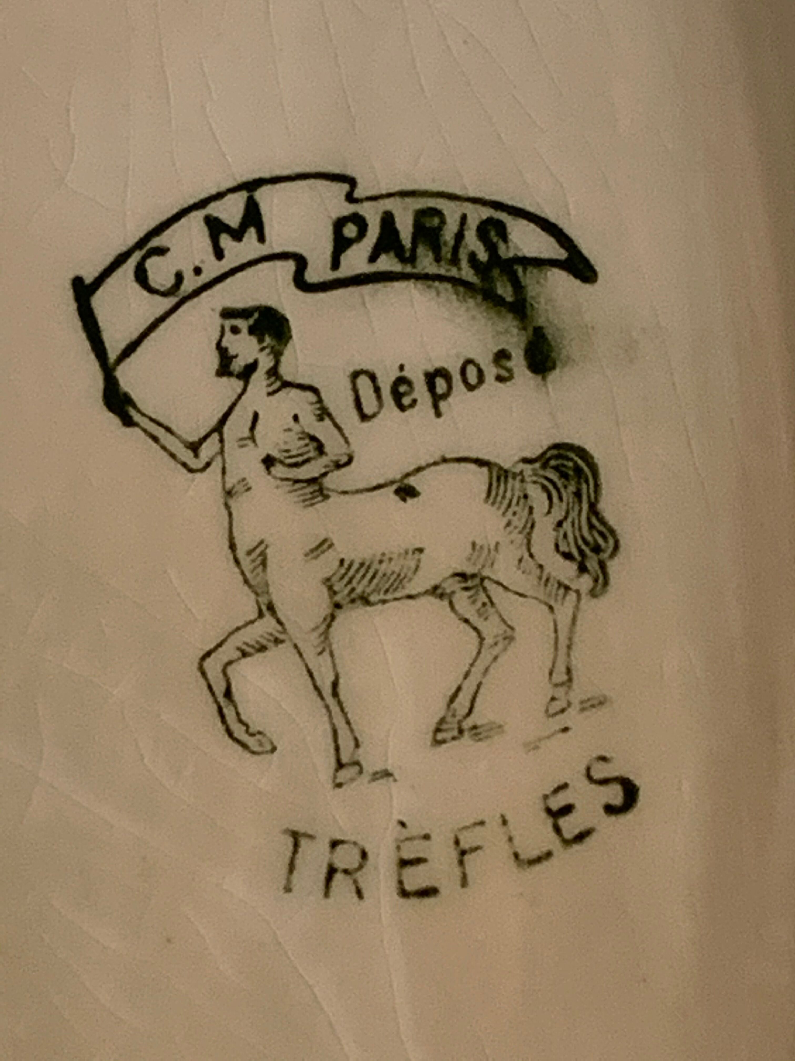 Pair of floral ravines in ancient earthenware Onnaing and CM Paris model Clovers