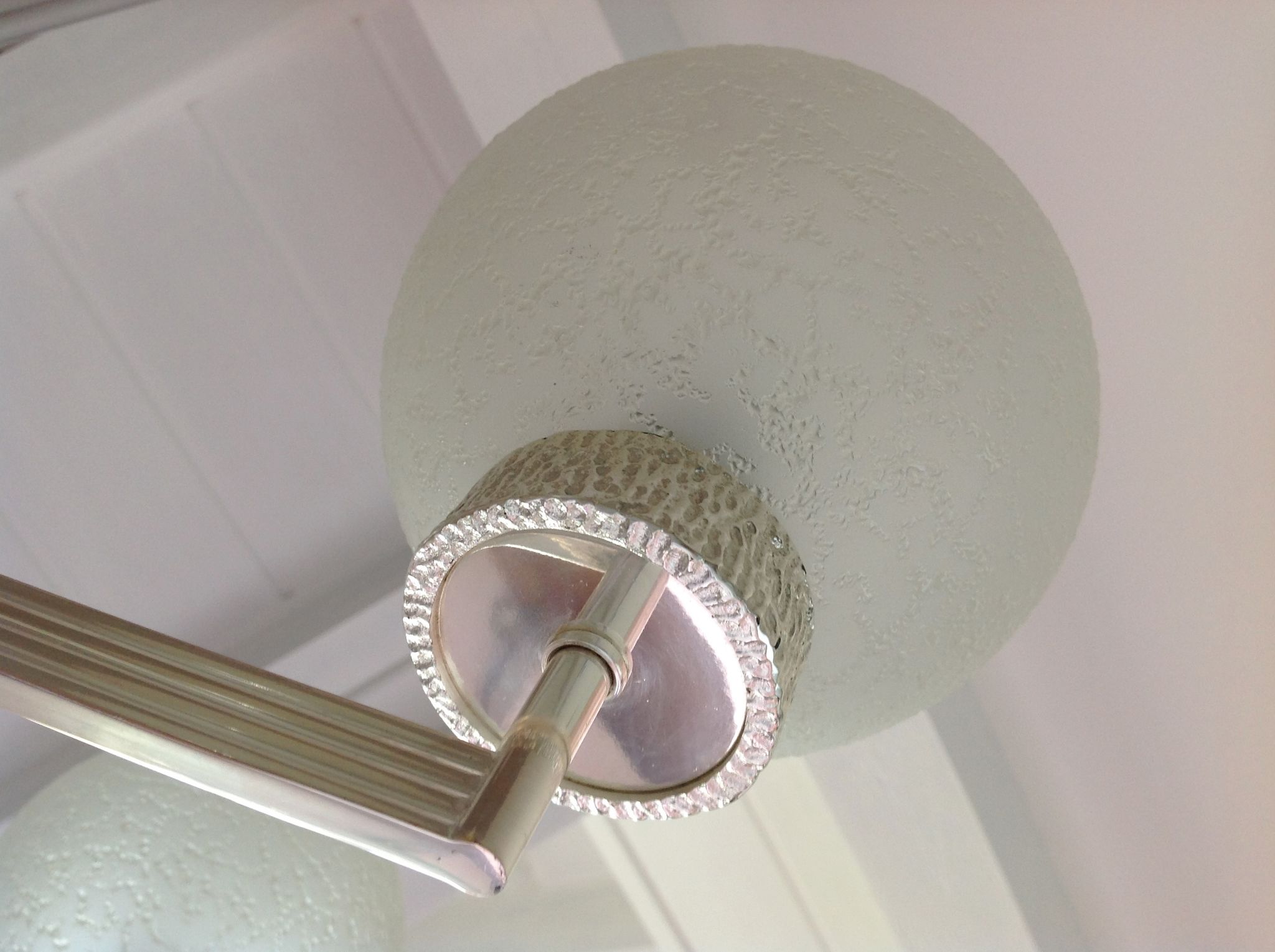Six-light chrome metal chandelier and opaque glass globes / vintage 60s and 70s