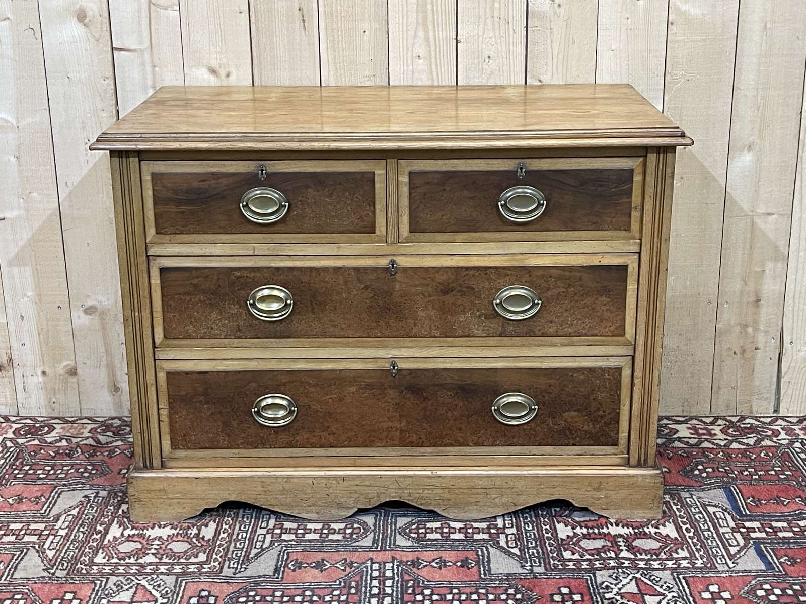 English chest of drawers in frene and nineteenth yew magnifying glass