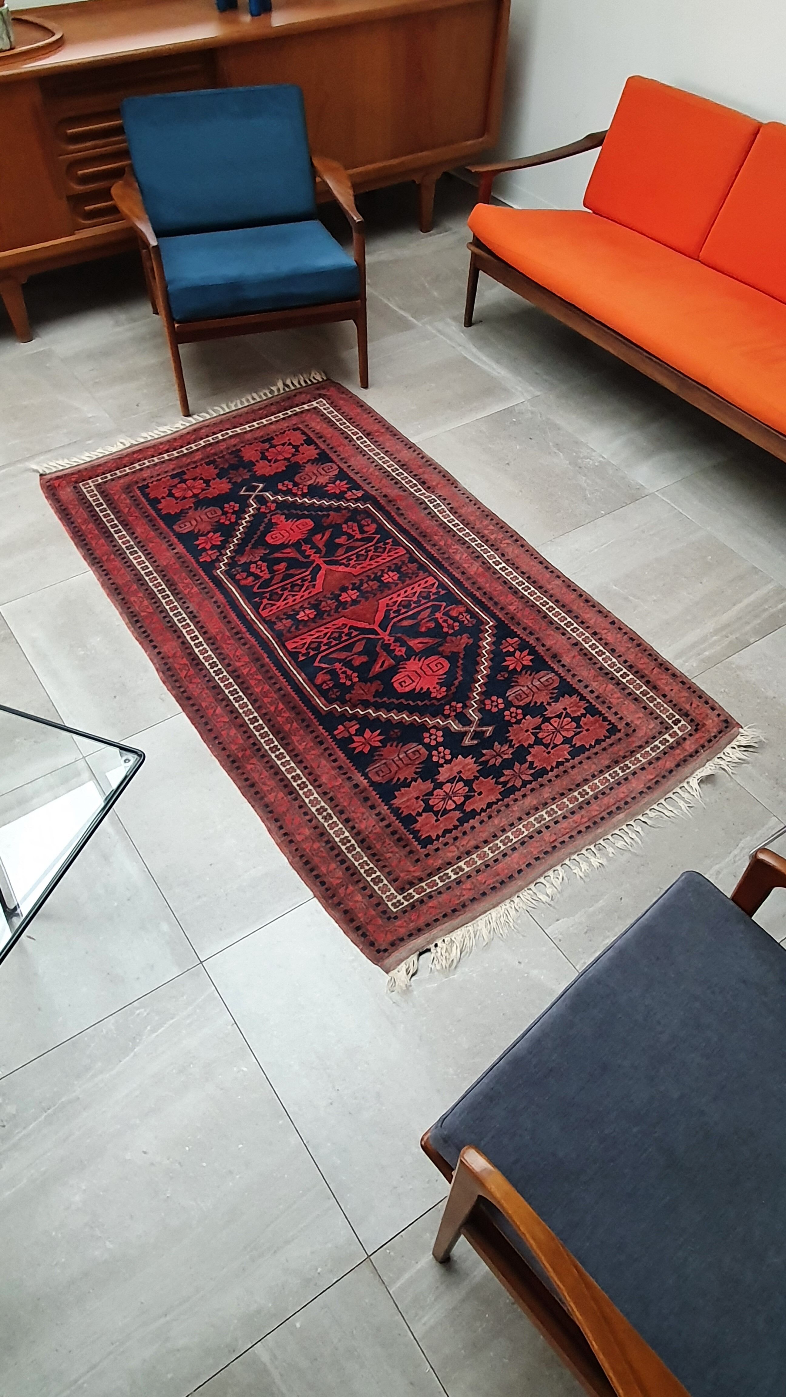 Old hand-knotted wool carpet