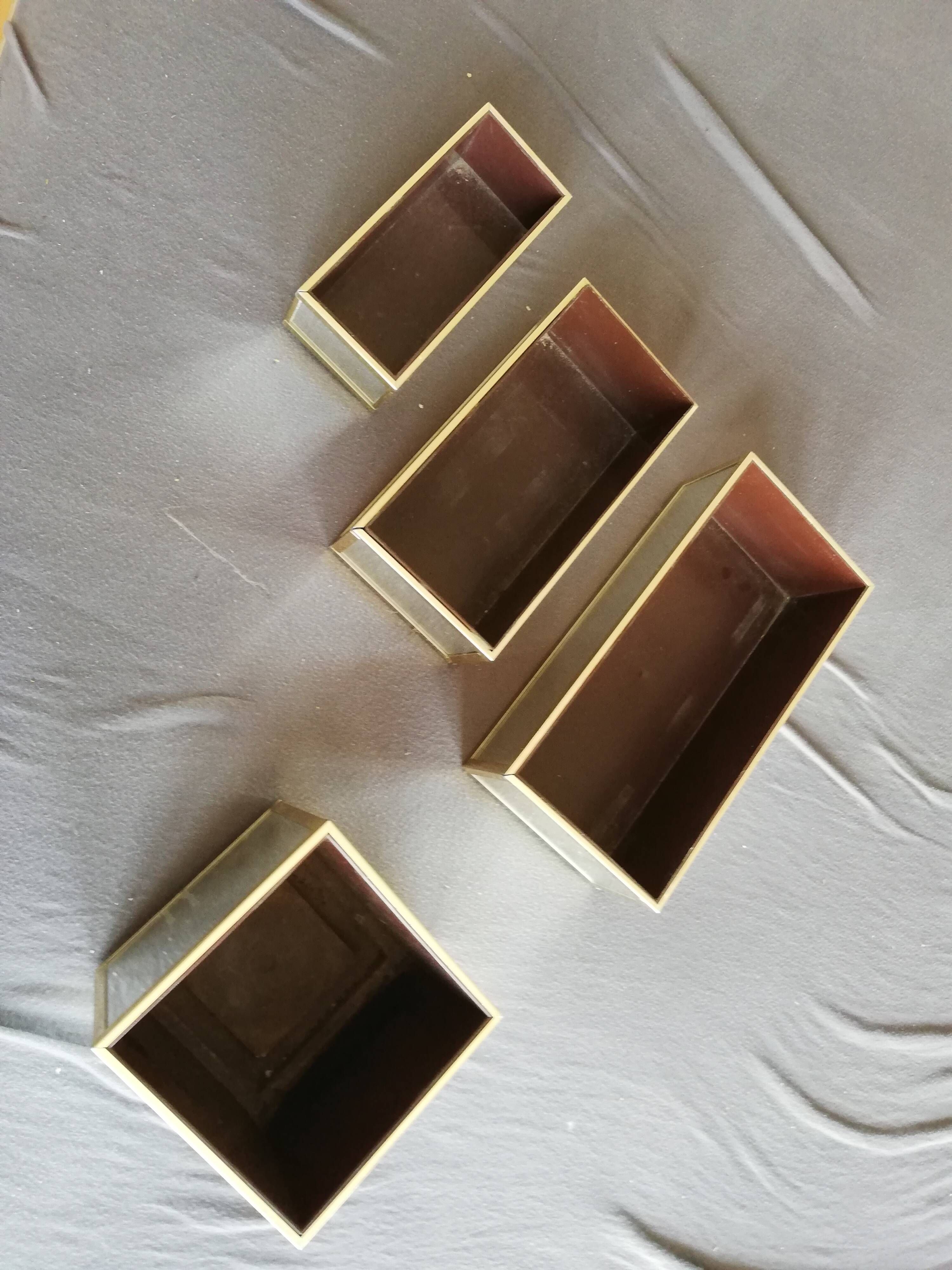 Golden metal table gardeners and Ousta design mirrors made in Holland