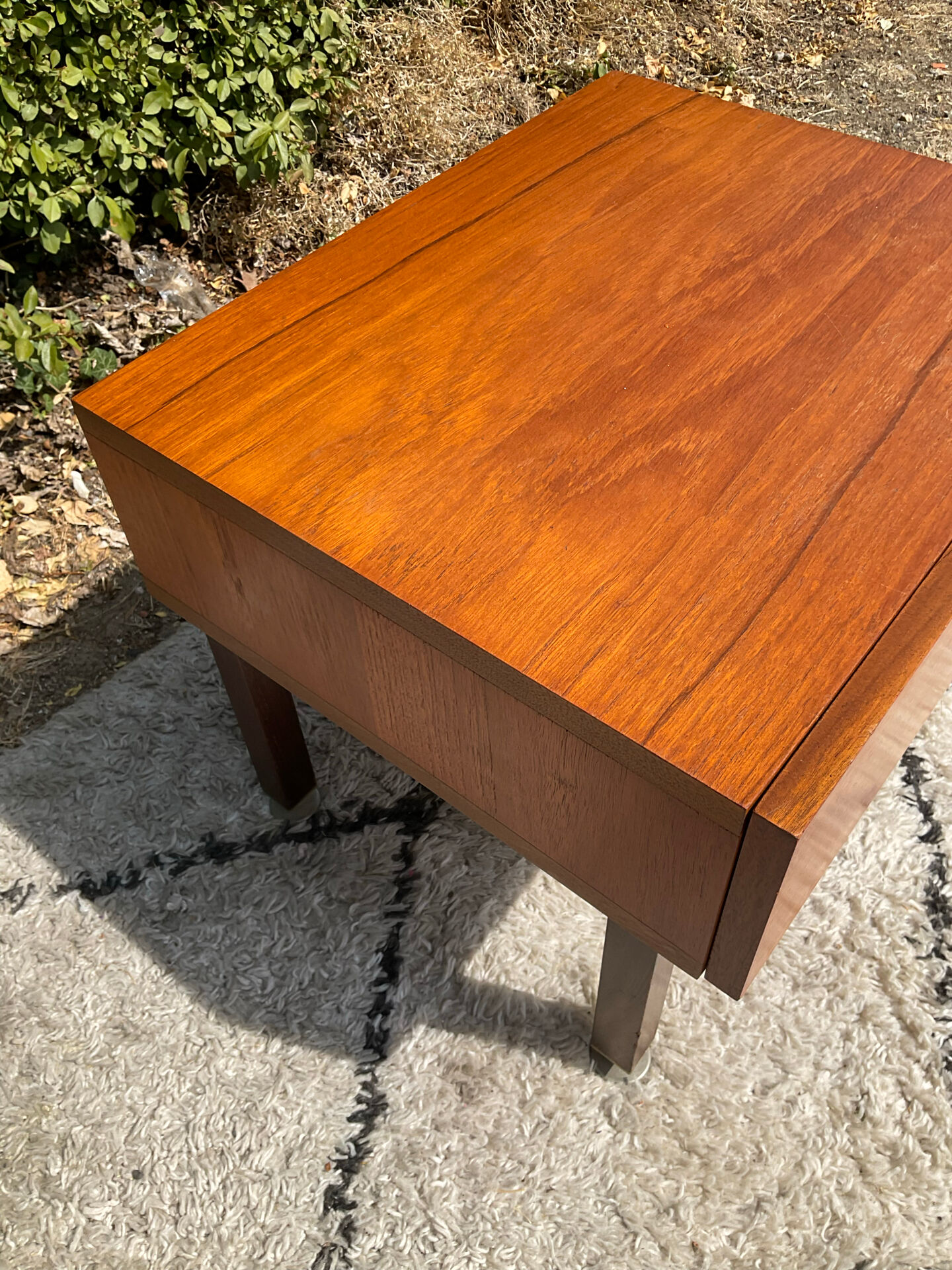 Vintage bedside table from the 60s-70s in teak.