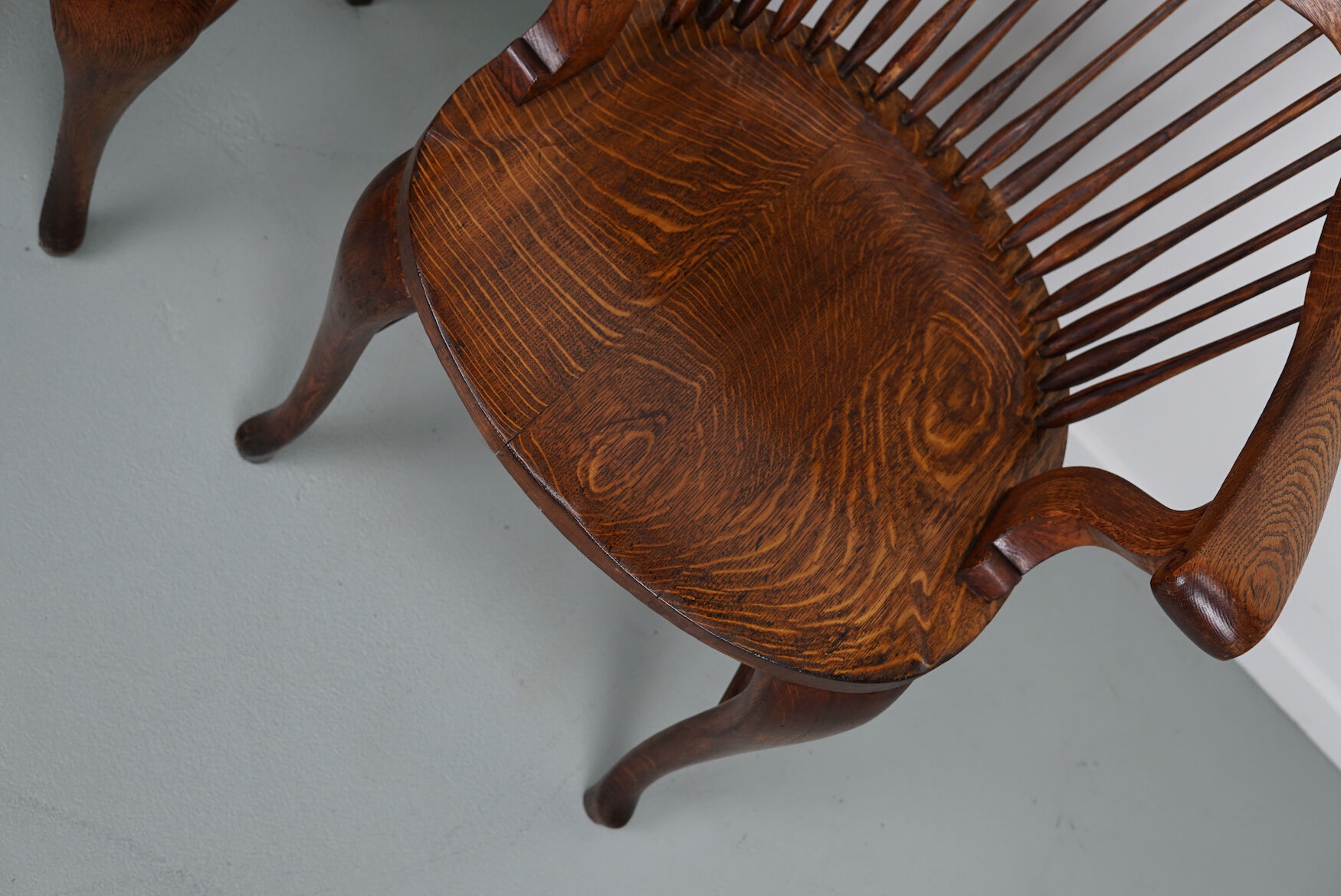 Pair of English Edwardian Oak Spindle Back Captains Office Desk Chairs