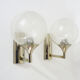 Pair of chrome metal wall sconces and blown glass
