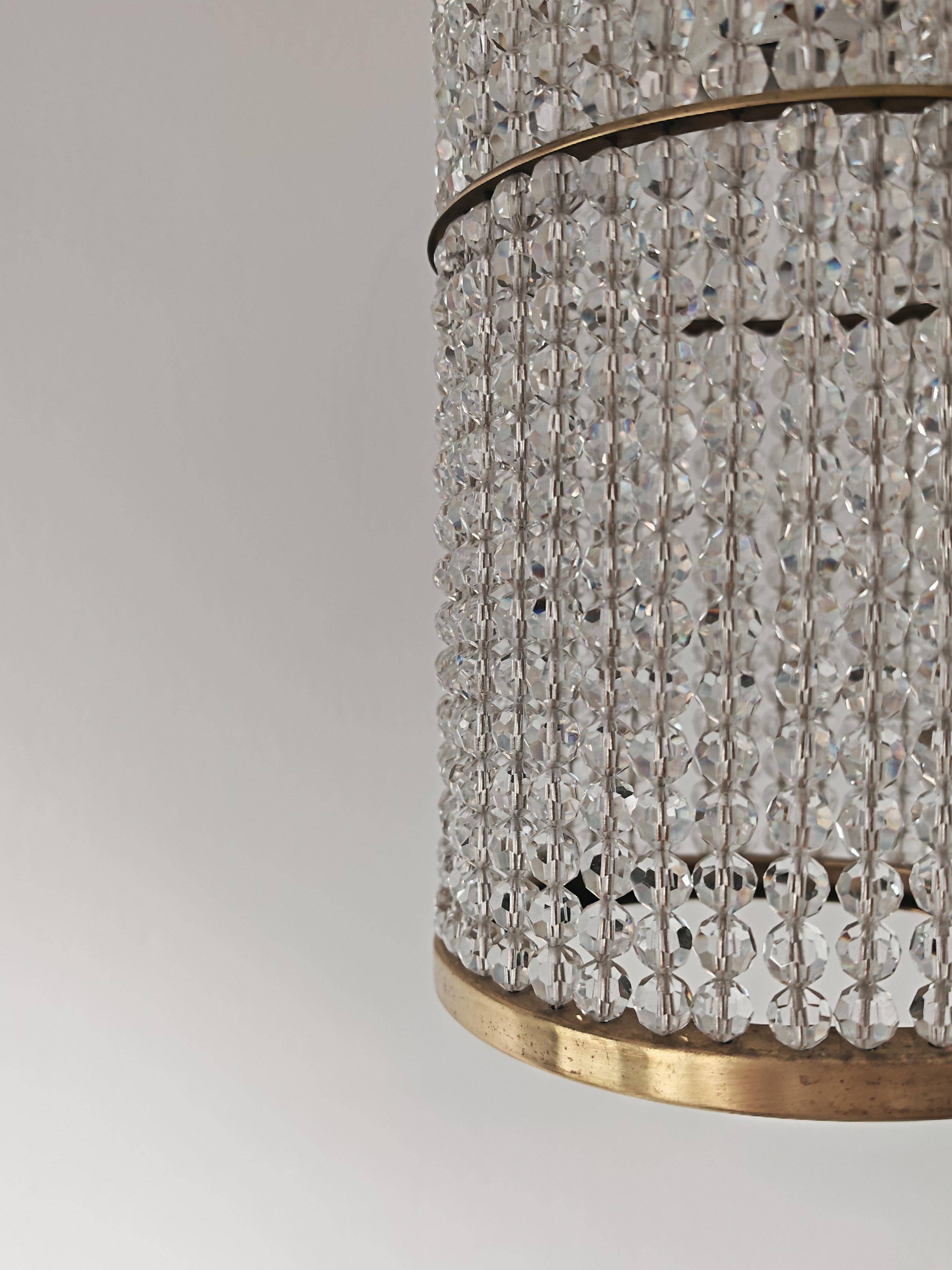 Set of 3 cylindrical crystal chandeliers in mid-century modern style attributed to Lobmeyr.