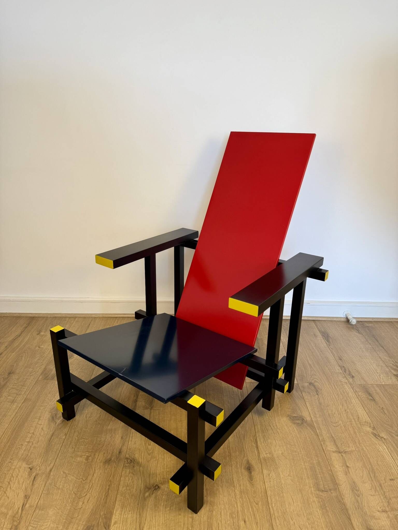 Red and Blue Chair in the Style of Gerrit Rietveld – De Stijl Movement