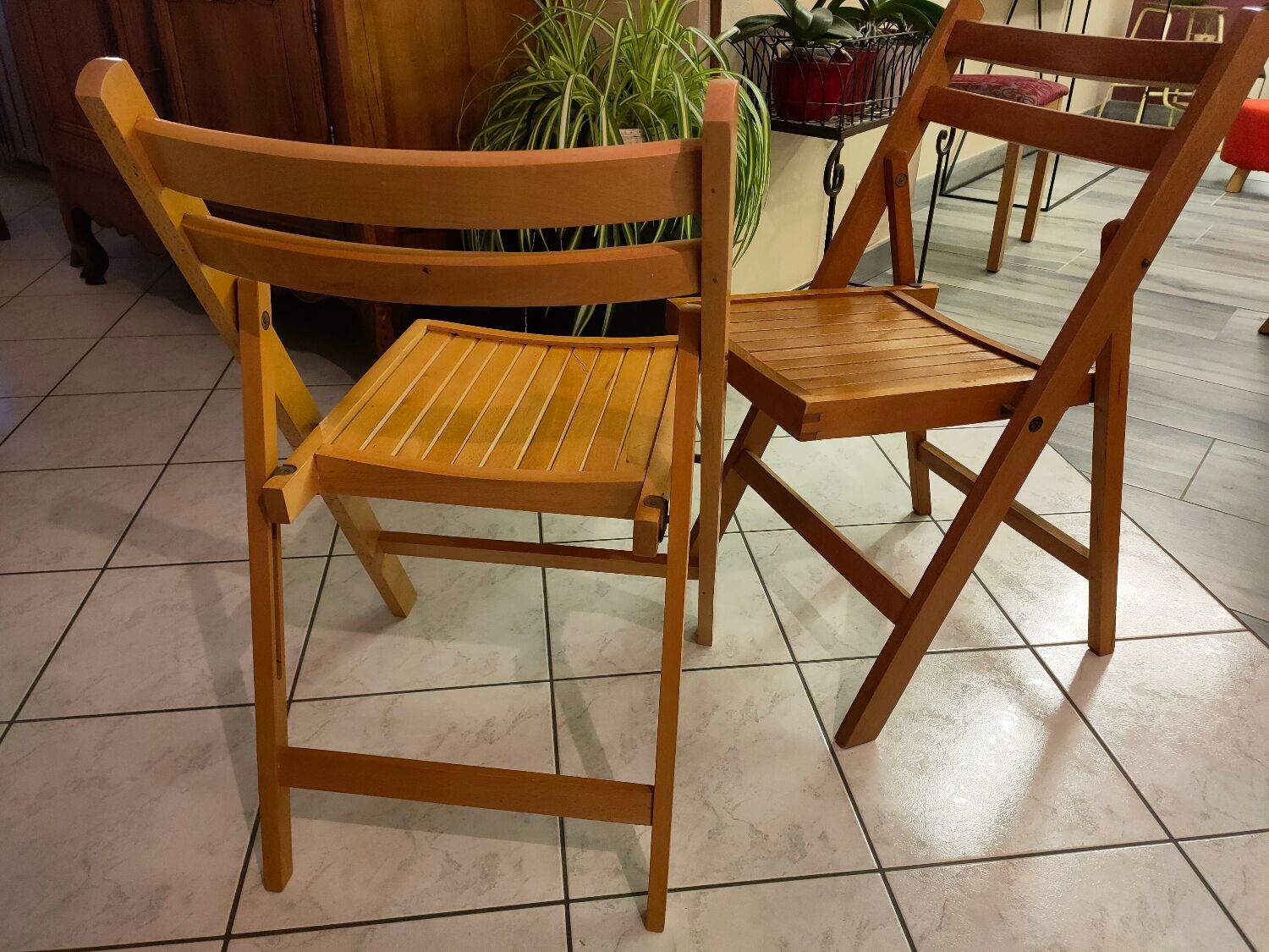 Pair of vintage folding wooden chairs