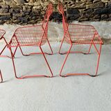 4 red design chairs