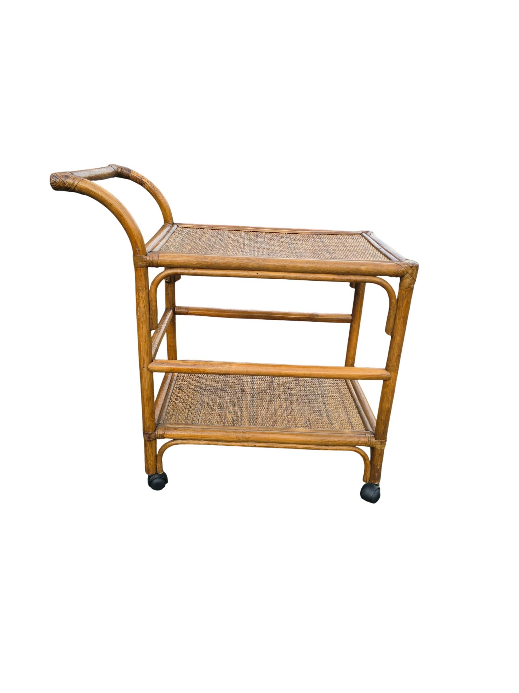 Vintage rolling dessert trolley in rattan and cane from the 60s/70s.