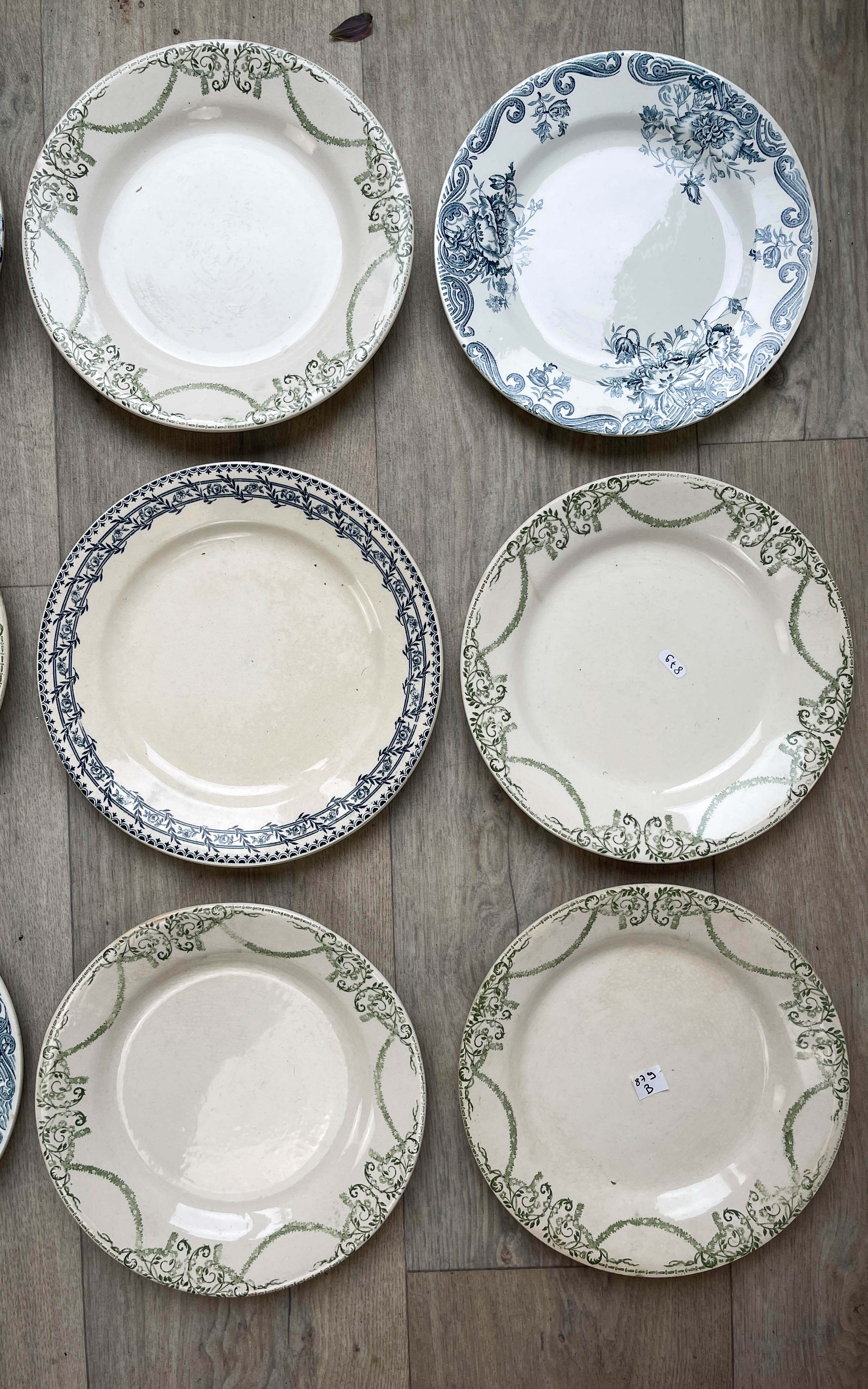6 green and blue mismatched iron earth plates