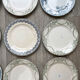6 green and blue mismatched iron earth plates