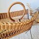 Vintage wicker and metal magazine rack