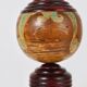 Decorative Kokeshi doll sculpture from northern Japan, hand-painted, signed.