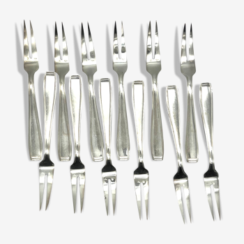 Ercuis 12 snail forks in a carthage model case