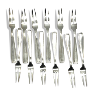 Ercuis 12 snail forks in a carthage model case